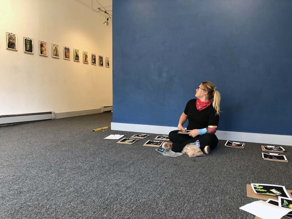 Photo by Molly Butler - Dinah Langsjøen preparing for her exhibit at The 410 Project