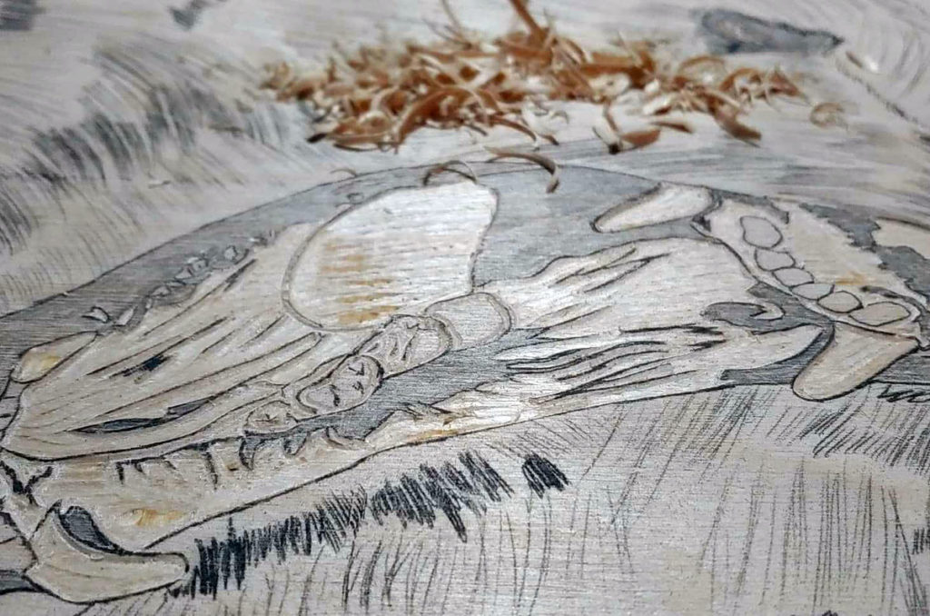 Photo by Cliff Coy - Bear woodcut in progress