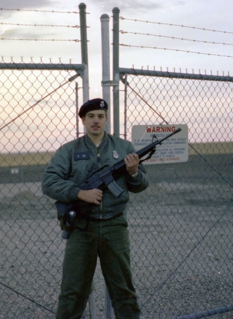 MankatoLIFE Publisher Don Lipps still wet behind the ears at approximately 19 as an Air Force Security Specialist. Minuteman III ICBM silo in the background