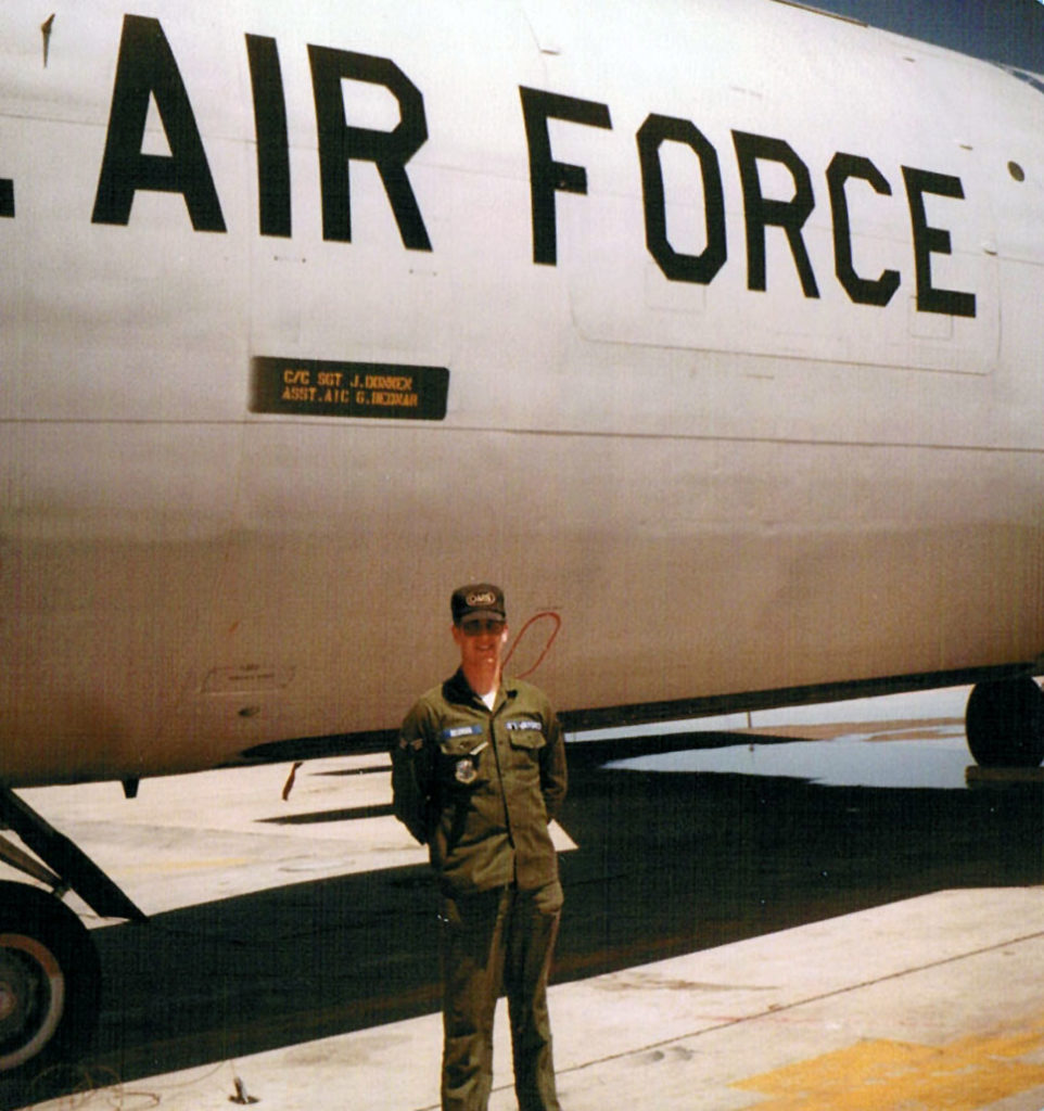 Submitted Photo - Airman First Class Greg Bednar stands in front of the Boeing KC-135 Stratotanker that he helped oversee as assistant crew chief.