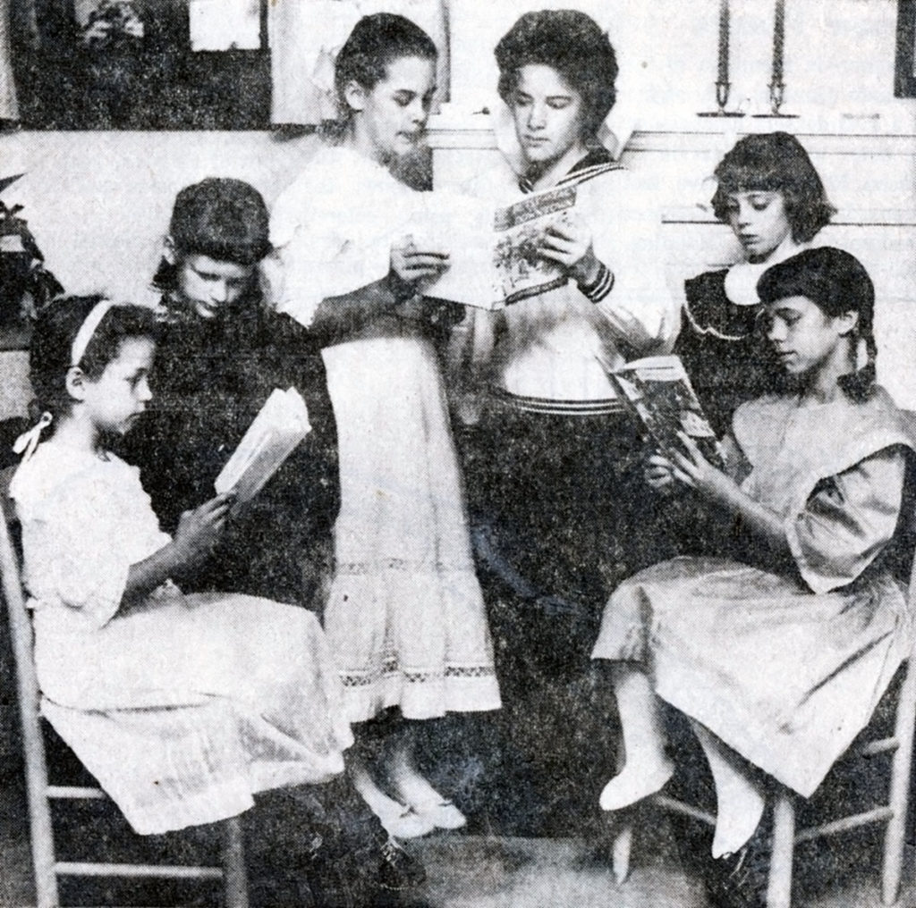 Photo and caption from October 5, 1961 Mankato Free Press - "Reviewing their favorite Betsy-Tacy books in preparation for their meeting with the author, Maud Hart Lovelace, October 6 and 7, are left to right: Lydia Sorensen, aged seven, daughter of Mr. and Mrs. Ed Sorensen of 803 Warren street, a 'Betsy'; Kathy Frahm, also seven, daughter of the Rev. and Mrs. Paul Frahm, 317 Willard, as a 'Tacy'; Margaret Hanson, daughter of Mr. and Mrs. Vernon Hanson of Petticoat Lane, another 'Betsy'; Cindy Cooper, daughter of Charles Cooper, Southview Heights, another 'Tacy'; Janet Burns, daughter of Mr. and Mrs. Bert Burns, 527 Byron street, (where this picture was taken), another 'Tacy,' and Marla Sugden, daughter of Mr. and Mrs. George Sugden Jr., of Skyline Drive, the third 'Betsy.'"