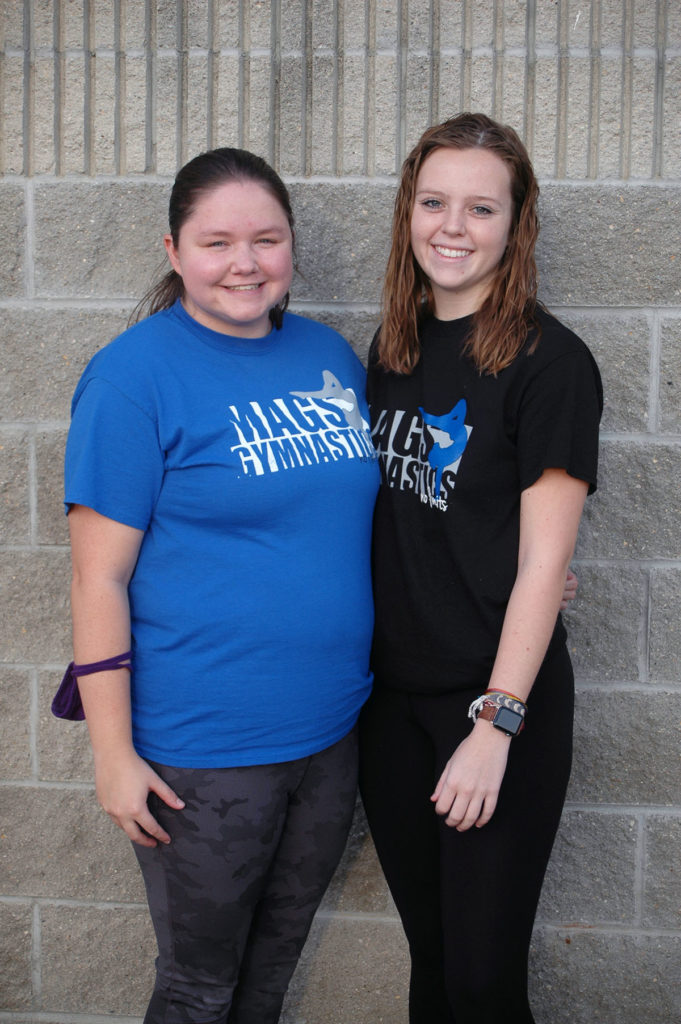 Photo by Don Lipps - Olivia Mikkelson and Haley Williams instructors at Mankato Area Gymnastics School