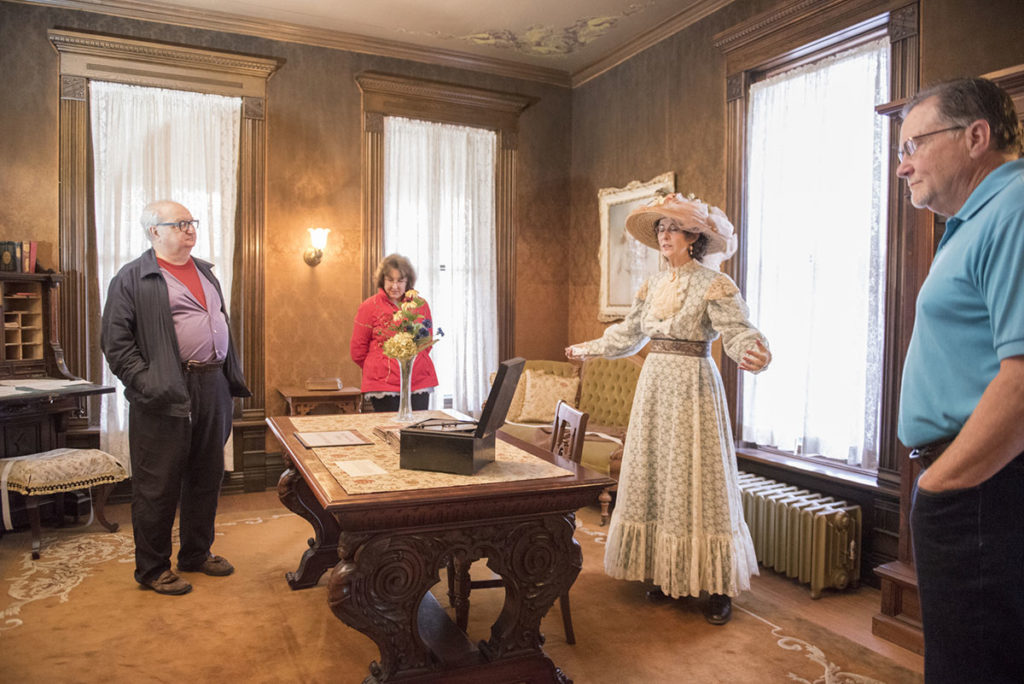 Submitted Image - Susan Hynes (in costume) and guests at the R. D. Hubbard House