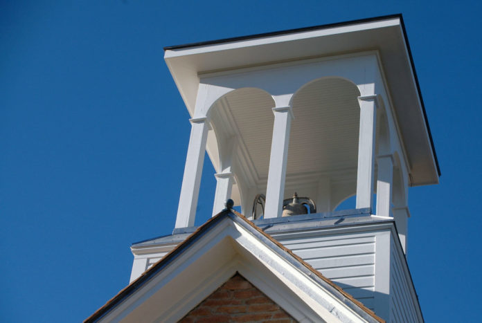 Photo by Don Lipps - The newly refurbished bell tower atop the Ottawa Little Stone Church.