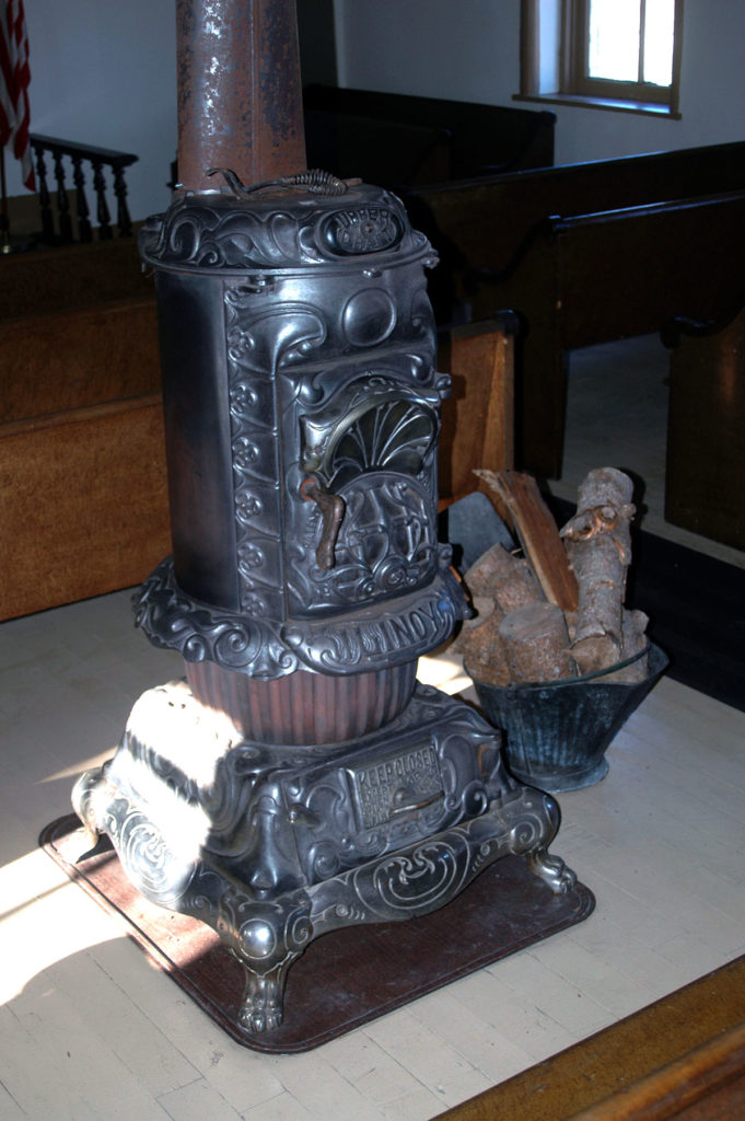 Photo by Don Lipps - Original wood burning stove in the Ottawa Little Stone Church