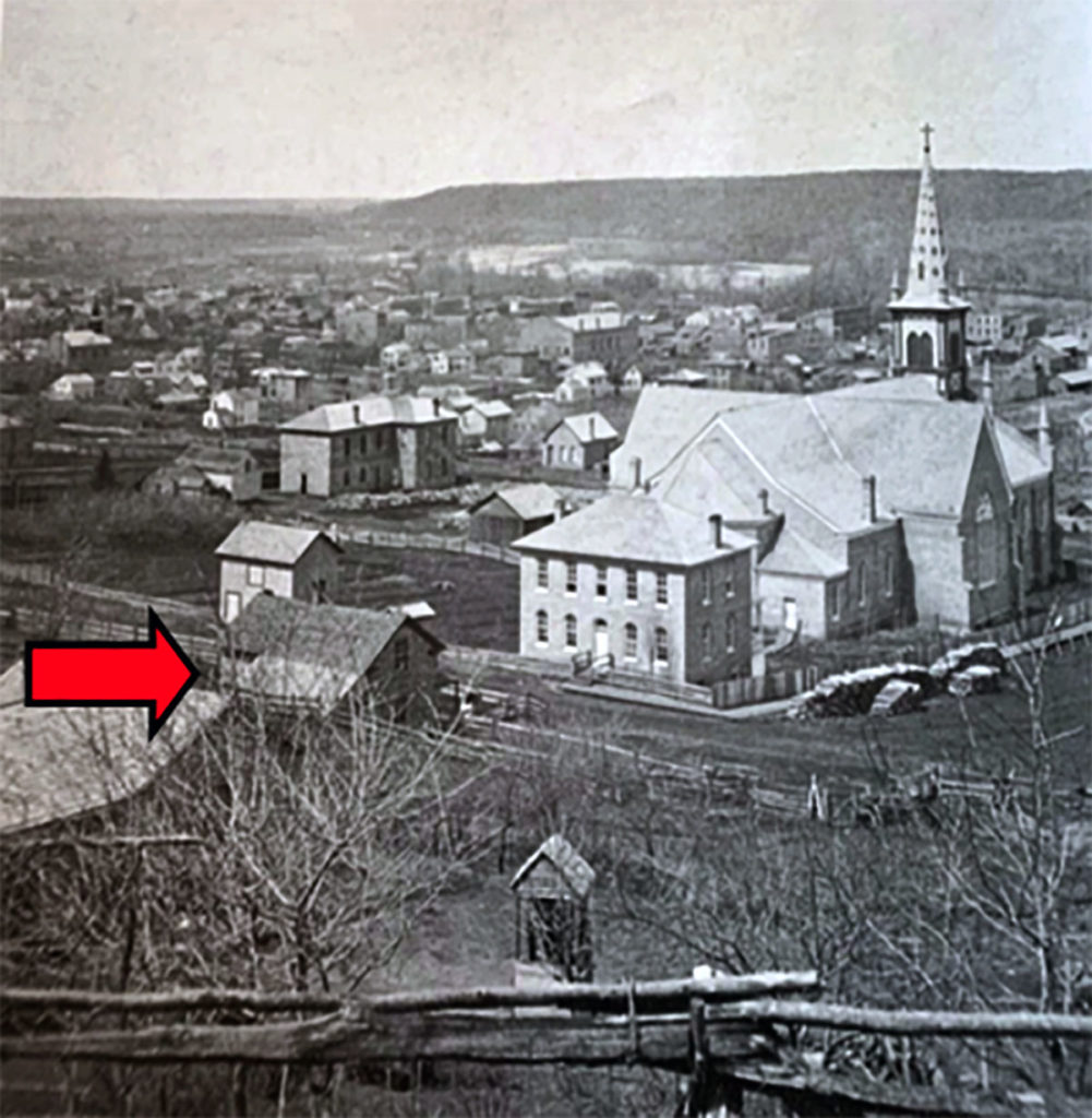 Photo from Minnesota Valley Memories, The Early Years, by The Free Press Media – 129 N. Sixth St. as shown in this photo taken in 1874