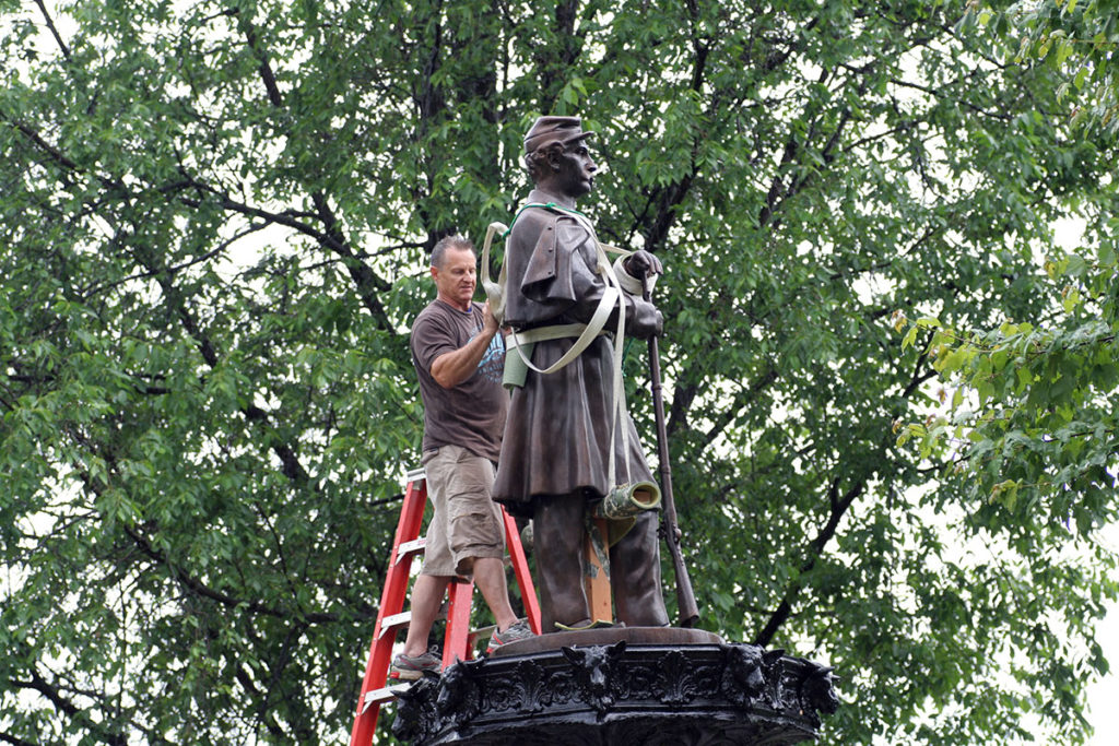 Submitted Photo - Sculptor Alan Gibson delivers and installs the Boy in Blue statue, May 29, 2015