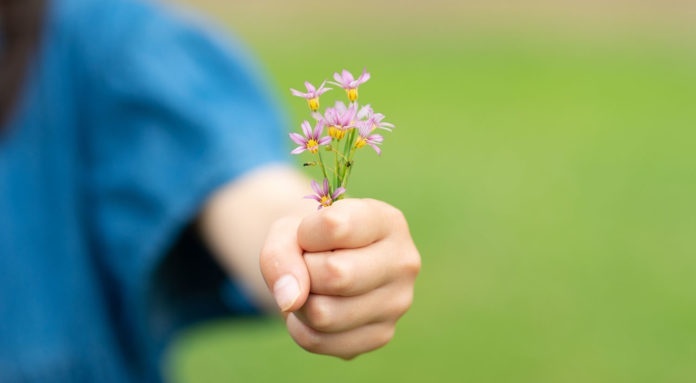 Hand and flowers