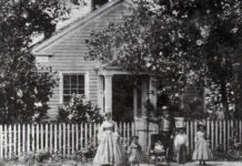 Photo Courtesy of Blue Earth County Historical Society - Home of Parsons King and Laura Johnson family in 1865. The house was built in 1854. L-R: Laura, Frank, Clarence, Parsons King, Charles and Julia.