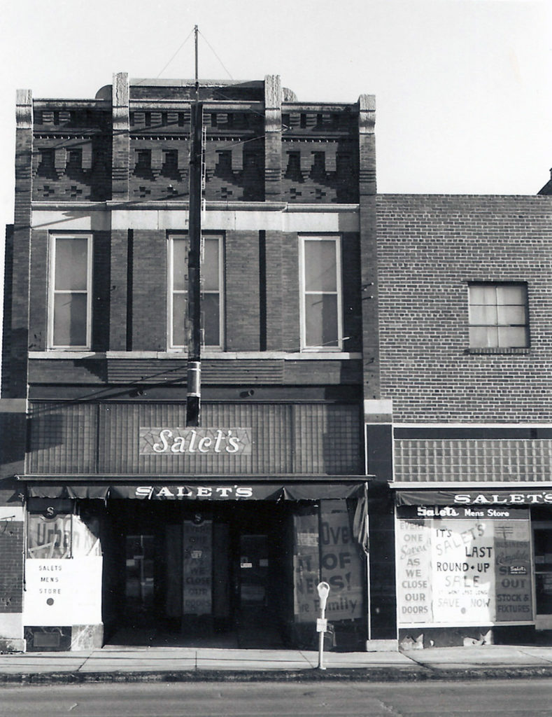 Photo Courtesy Blue Earth County Historical Society — Signs in the windows show Salet’s stores impending doom.