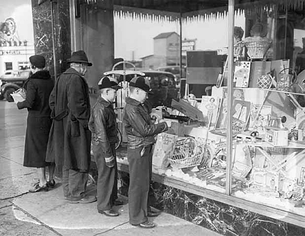 Photo Courtesy Blue Earth County Historical Society – Young boys are seen looking at wares in the Salet’s window in 1939.