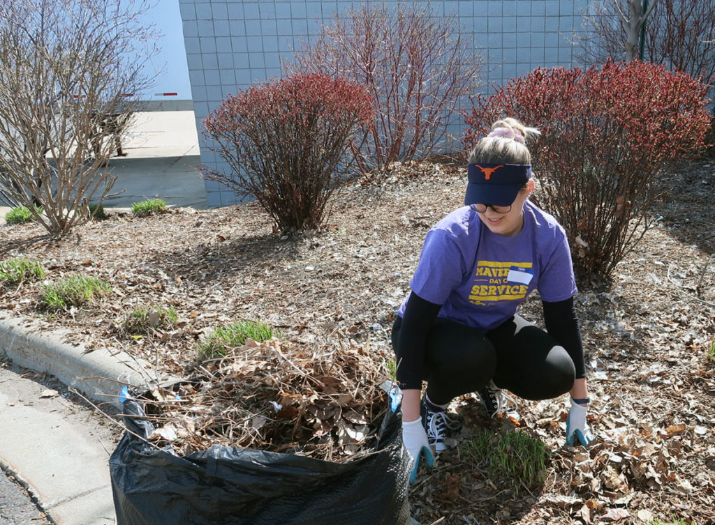 Photo by Meredith Maxwell - Ellie McDonald doing landscape work outside at MVAC.