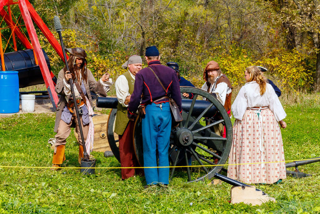 Photo by Rick Pepper - Historical re-enactors preparing the cannon.
