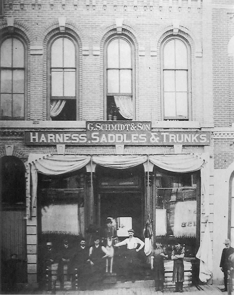 Photo Courtesy Maud Hart Lovelace’s Deep Valley by Julie A. Schrader - Gottlieb Schmidt & Son Harness, Saddles & Trunks, ca. 1890 This business survived over four generations of family management. Schmidt’s was Mankato’s oldest retail business until it closed in 1986 after 127 years in business. Note the iconic dapple gray wooden horse in the front of the shop. Mankato-born author Maud Hart Lovelace wrote about it in the Betsy-Tacy books